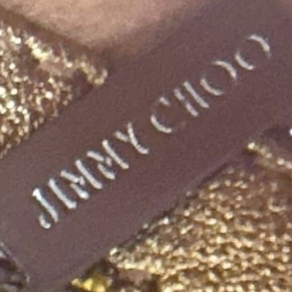 Jimmy Choo Metallic Gold
Snakeskin Leather Tulita Pochette
Bag - Picture 4 of 15